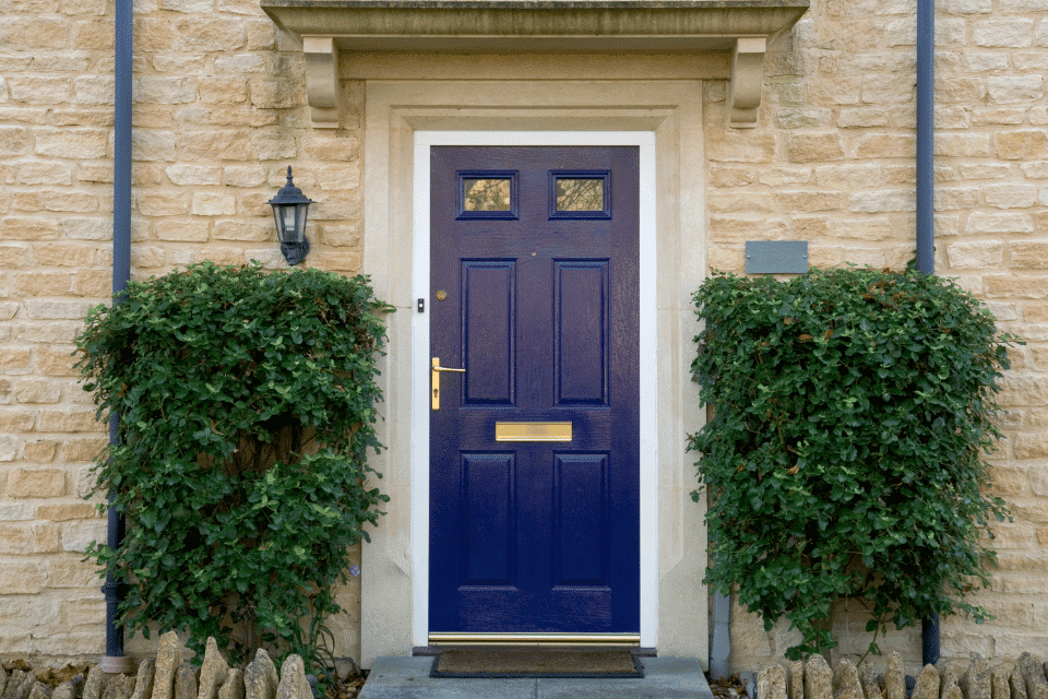 image of a blue front door of a residential property in the UK
